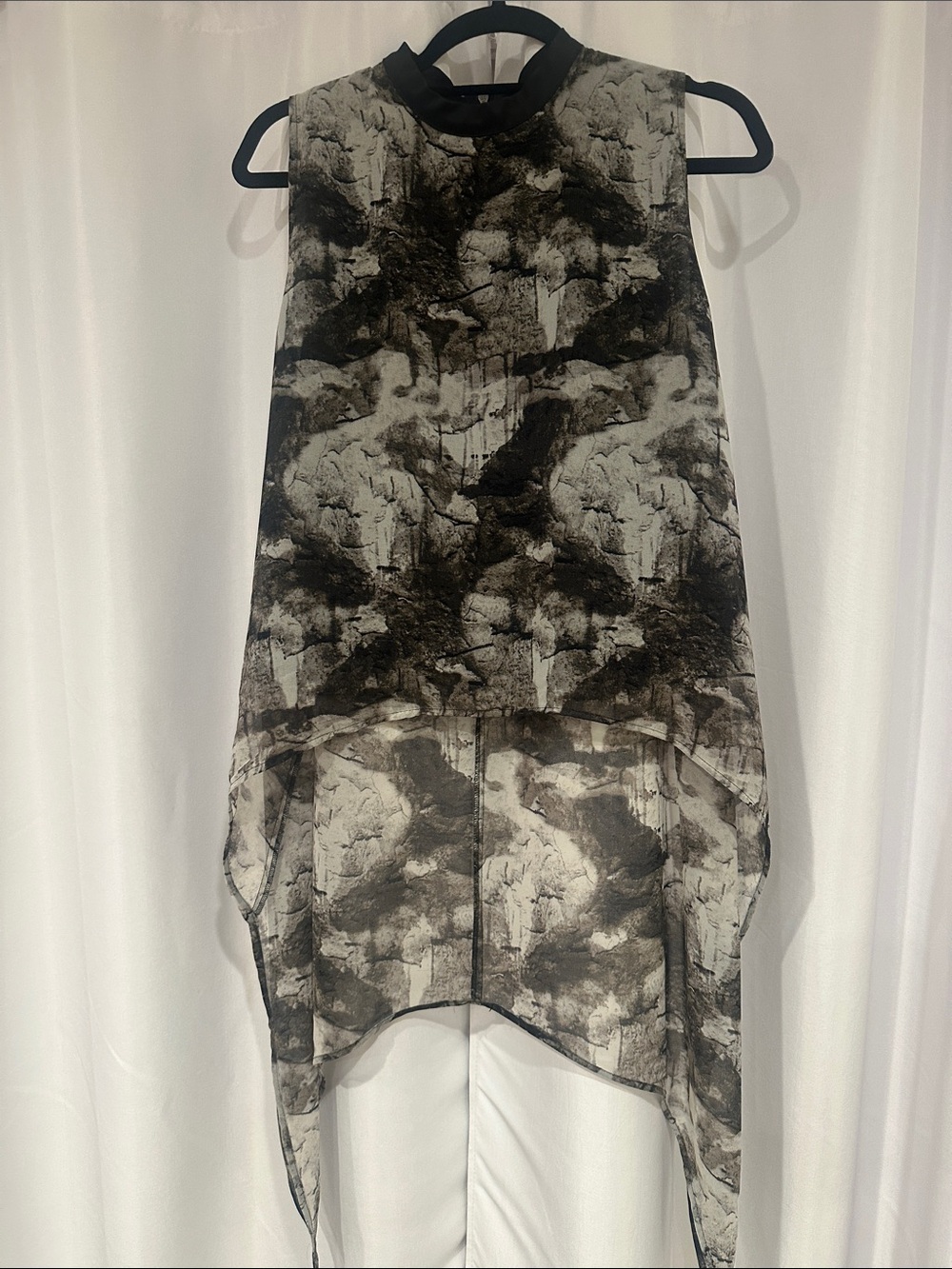 Divided Black and White Sheer High-Low Sleeveless Blouse